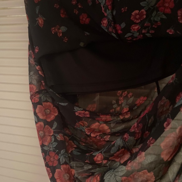 Long black skirt with red roses. Brand: Forever 21, Color: Black with red roses. - Picture 2 of 3